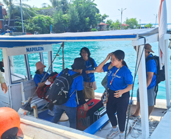 Volunteers on a boat during a TNR mission